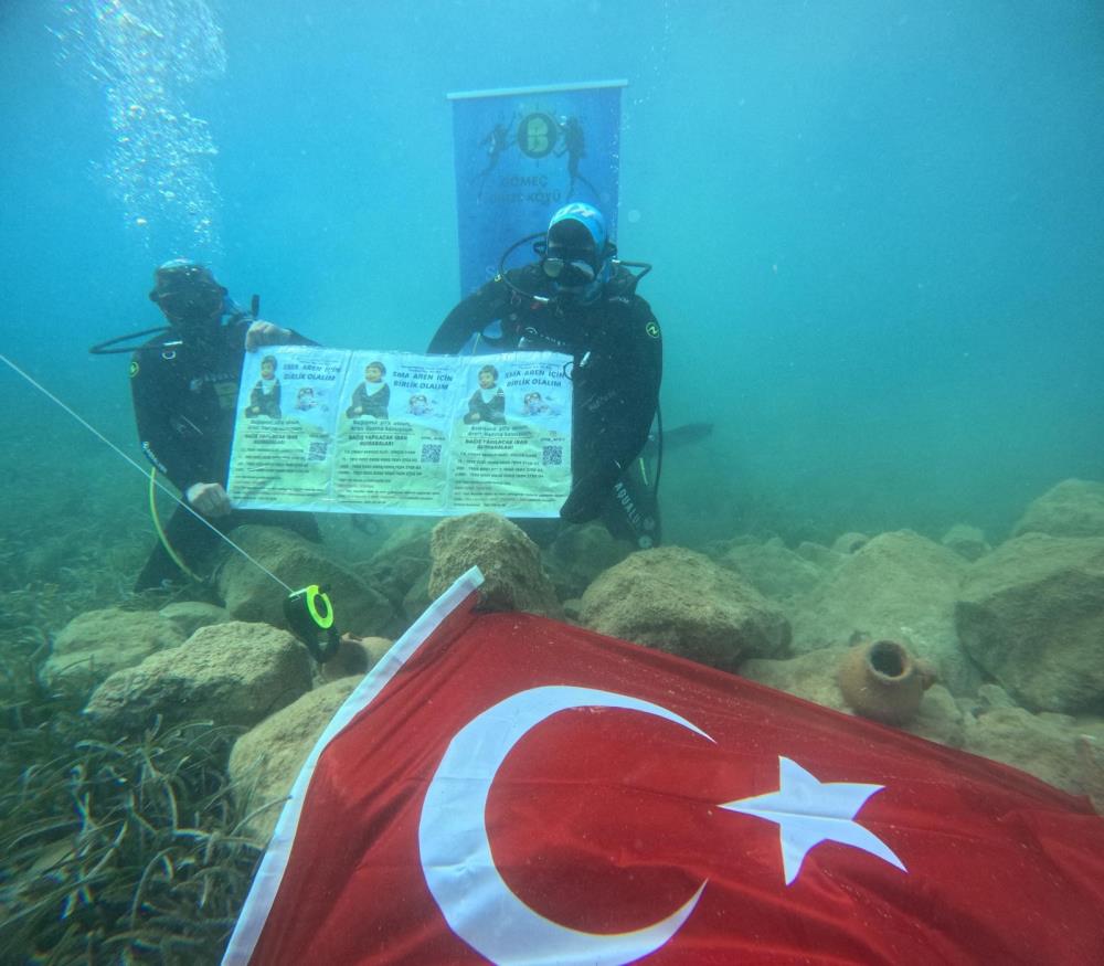 SMA’LI AREN BEBEK İÇİN DENİZ ALTINDA BAYRAK AÇTILAR